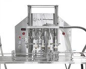 Industrial Bottler for maple syrup close up